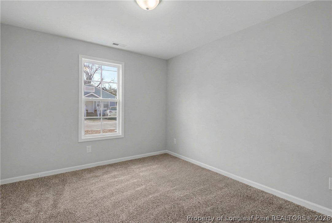 214 Lee Street Spring Lake, NC 28390 - Photo 31 of 44 an empty room with a window