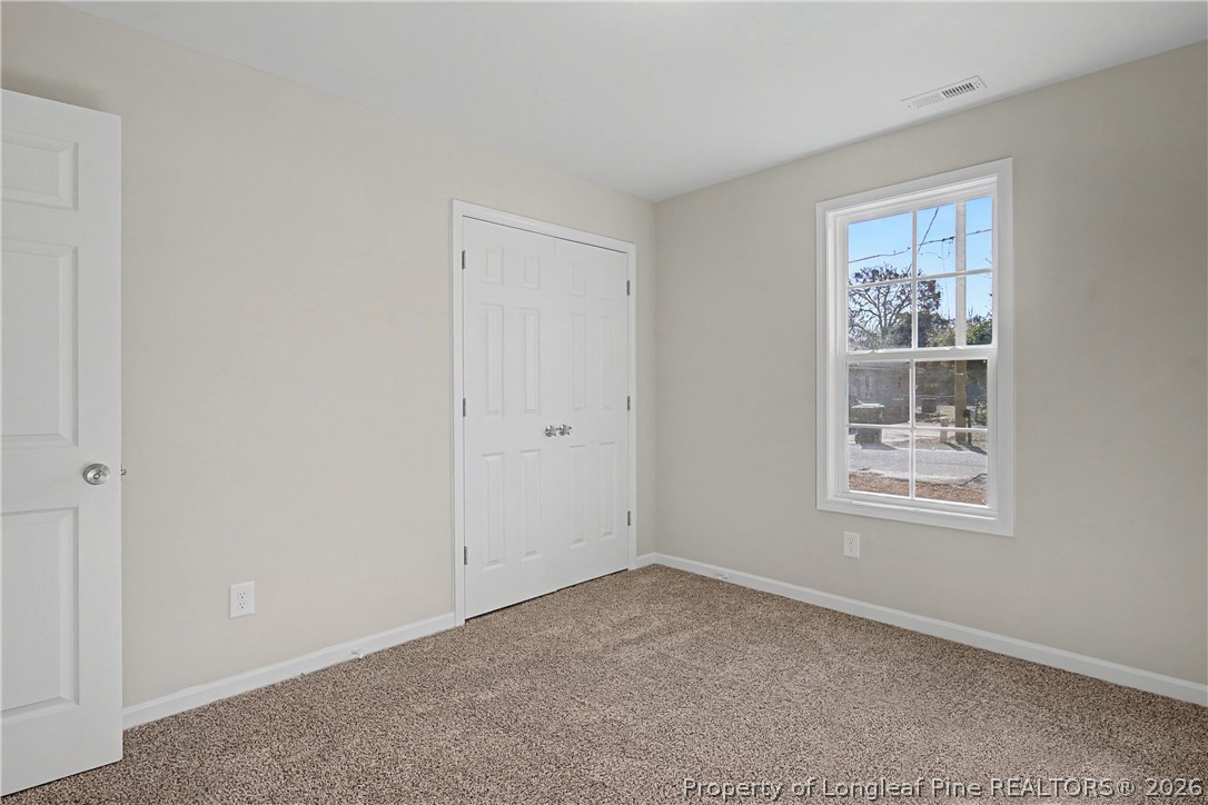 214 Lee Street Spring Lake, NC 28390 - Photo 34 of 44 a view of an empty room with a window