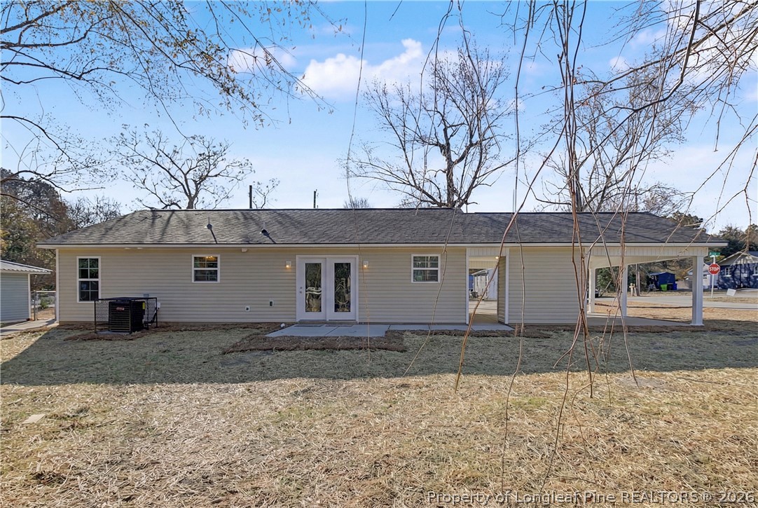 214 Lee Street Spring Lake, NC 28390 - Photo 42 of 44 front view of a house with a yard