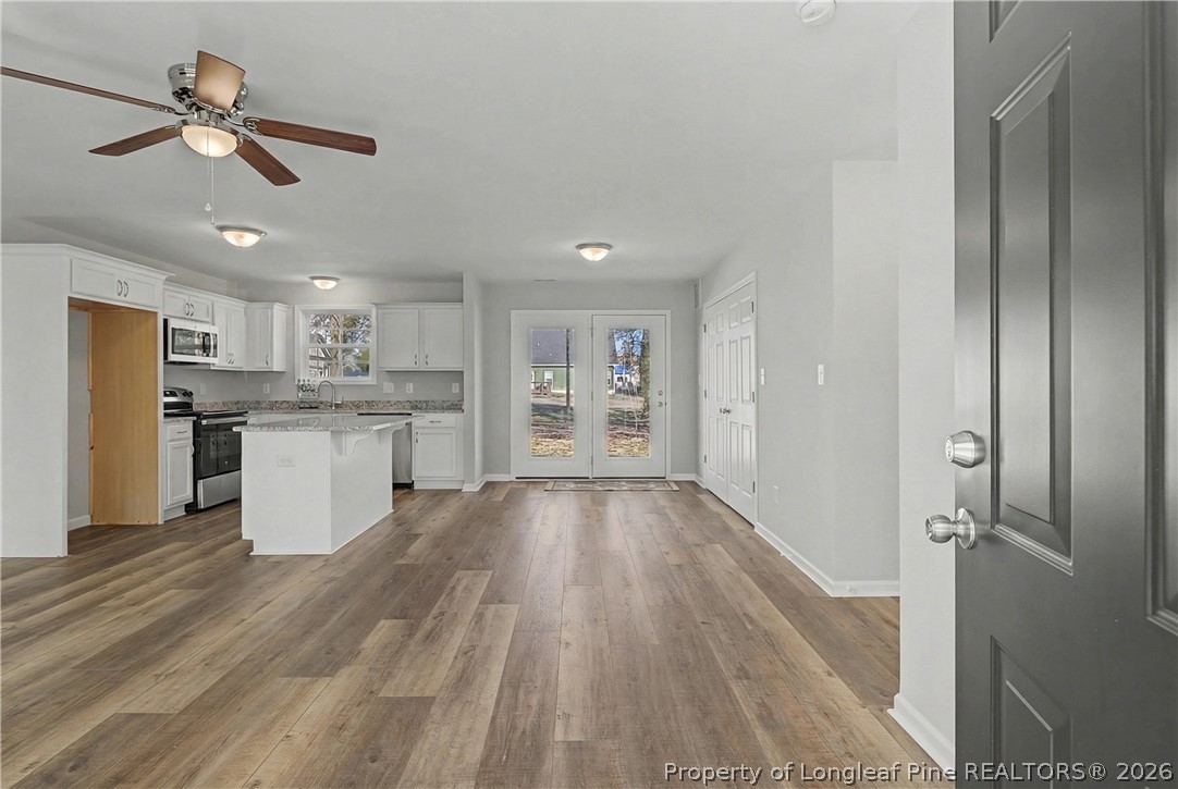214 Lee Street Spring Lake, NC 28390 - Photo 5 of 44 a view of a kitchen with stove and cabinets