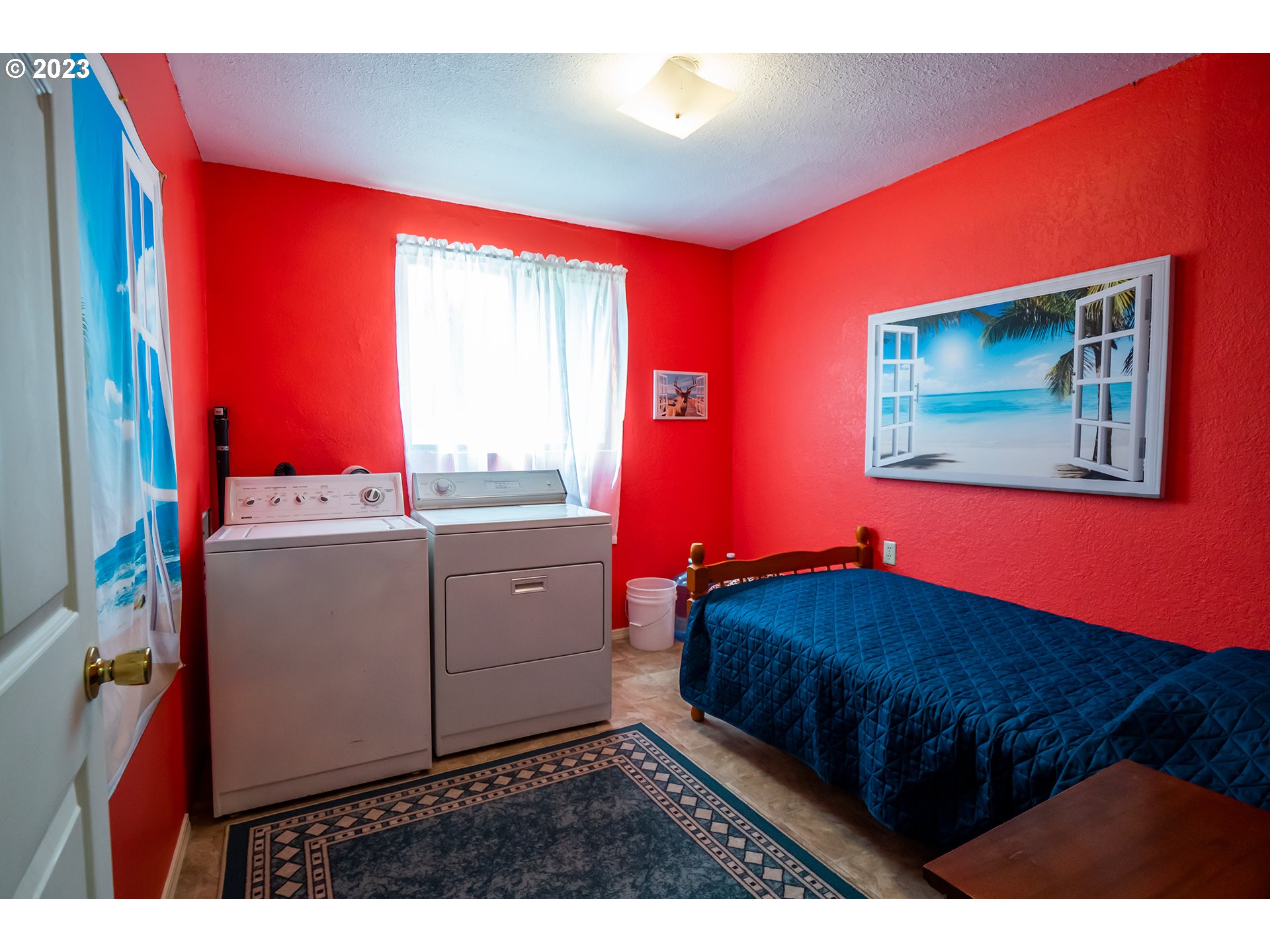 18624 Highway 36 Blachly, OR 97412 - Photo 35 of 46 a room with a bed and wooden floor