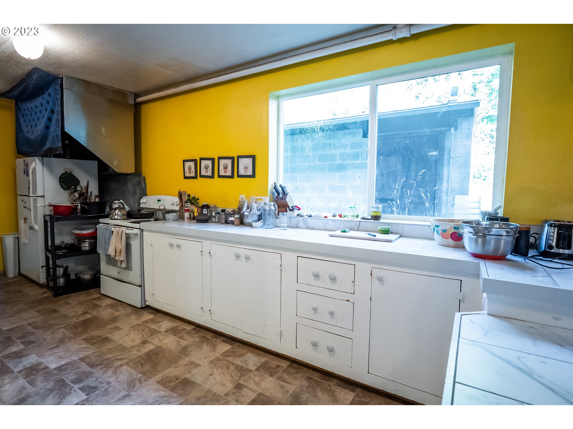 18624 Highway 36 Blachly, OR 97412 - Photo 37 of 46 a kitchen with sink cabinets and a large window