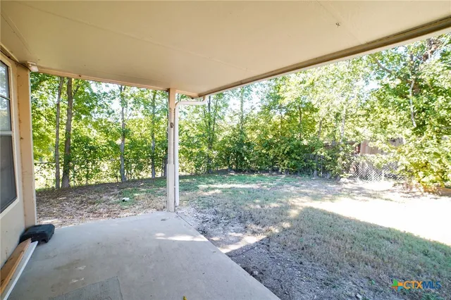 a view of a yard with porch