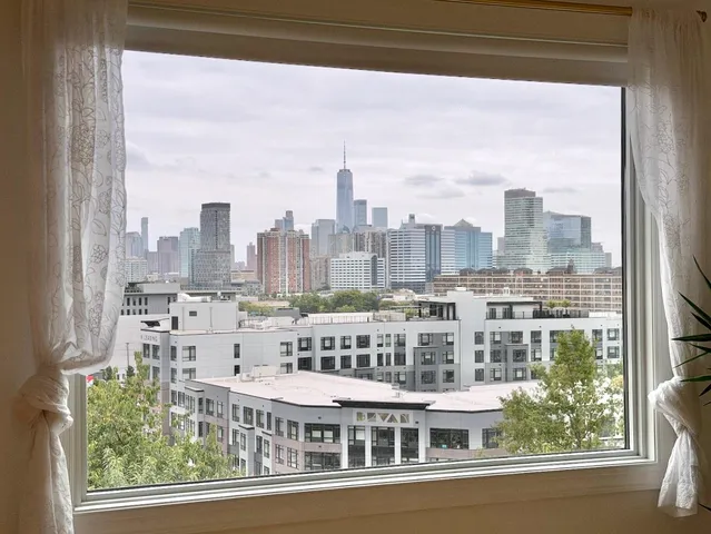 a view of a city that has tall buildings