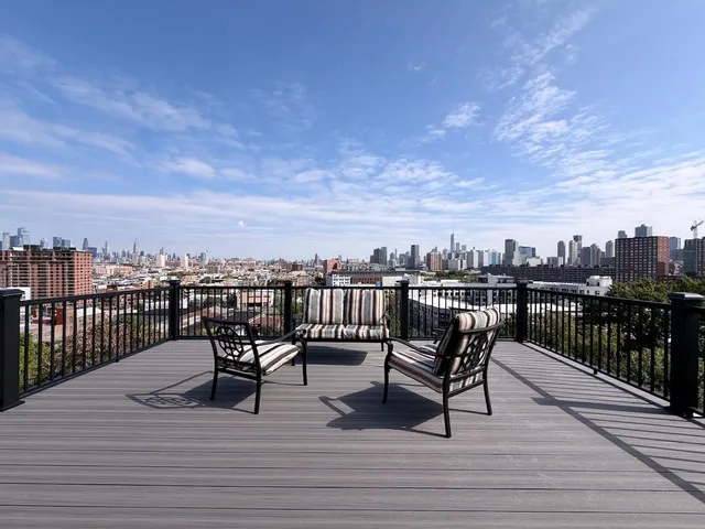 a view of a terrace with furniture