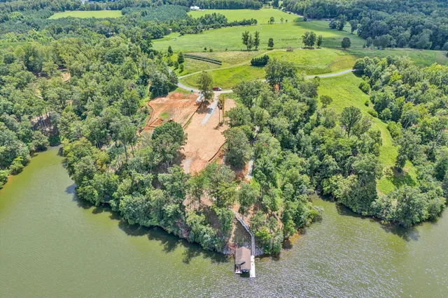 a view of a lake with a house