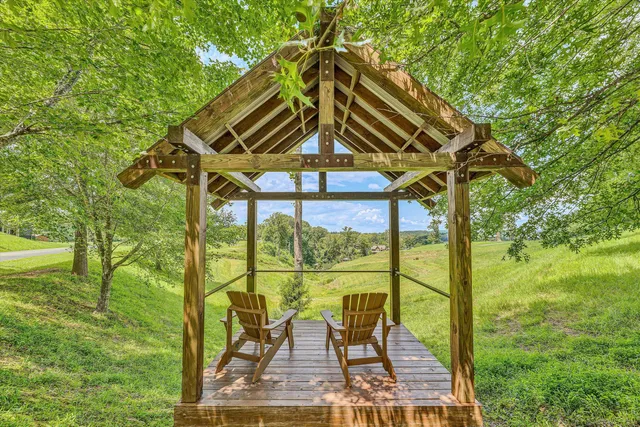 a view of an outdoor space with furniture