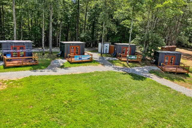 a view of a chairs and table in the garden