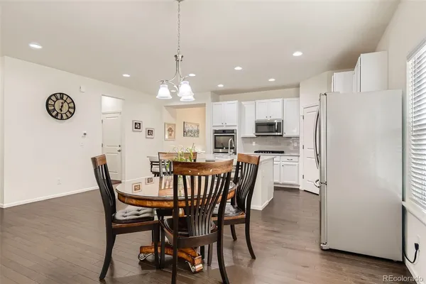 a view of a dining room with furniture