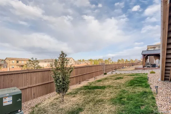 a view of a yard in front of a house