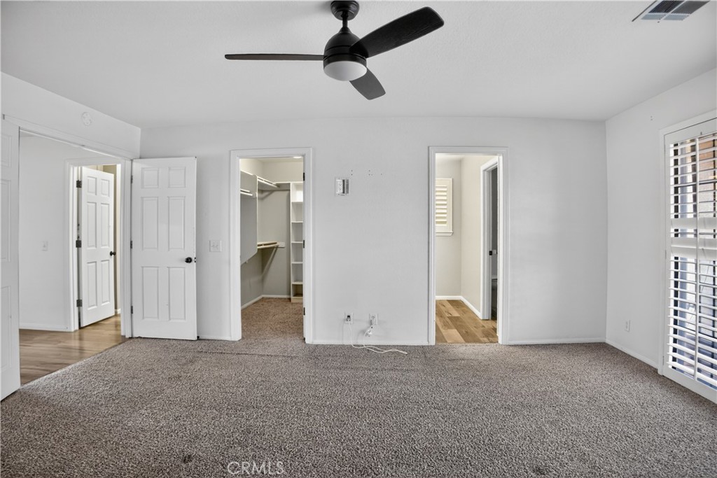 43631 37th Street West Lancaster, CA 93536 - Photo 25 of 38 a view of an empty room with closet and a window