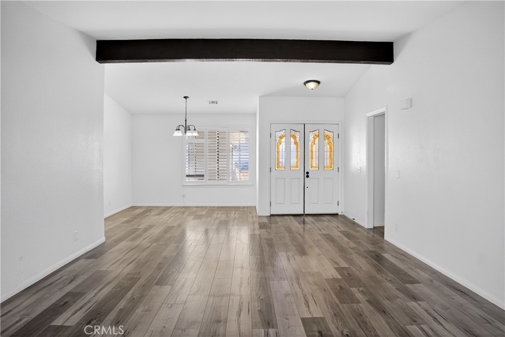 43631 37th Street West Lancaster, CA 93536 - Photo 3 of 38 a view of a livingroom with wooden floor