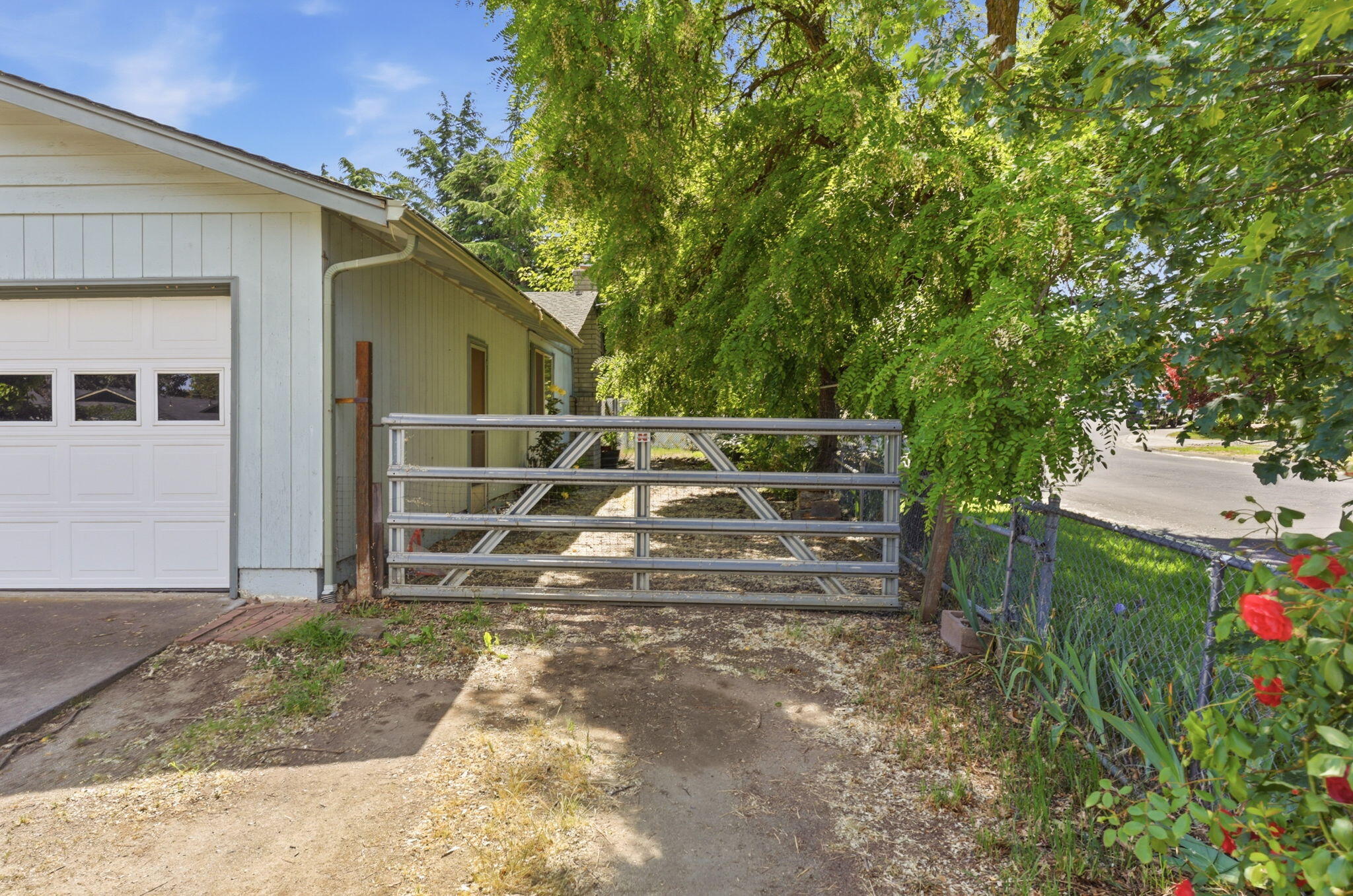 102 Elm Street Phoenix, OR 97535 - Photo 9 of 28 a view of house with backyard