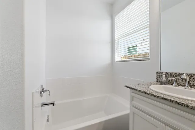 a bedroom with a bed and a closet