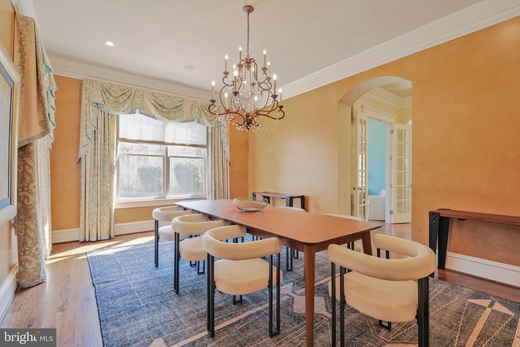 833 Herbert Springs Road Alexandria, VA 22308 - Photo 16 of 34 a view of a dining room with furniture window and wooden floor