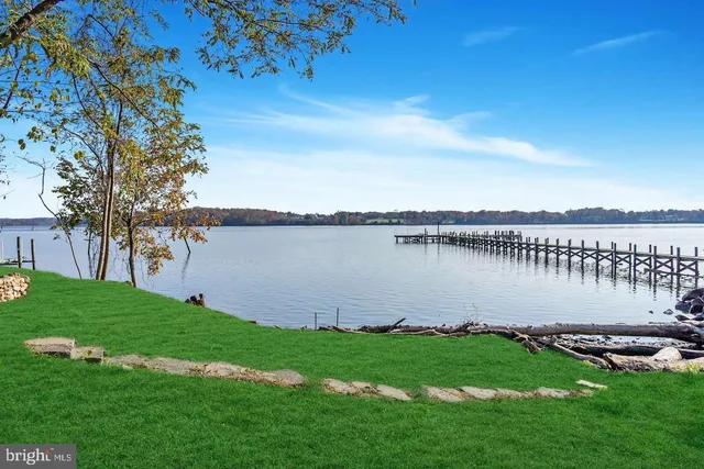 a view of a lake with a big yard