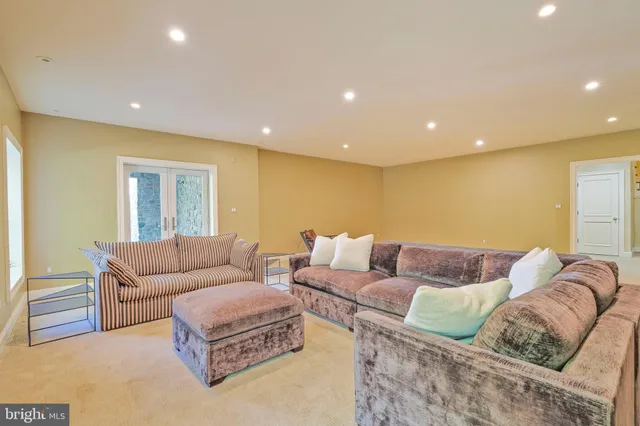 a living room with furniture and a couch