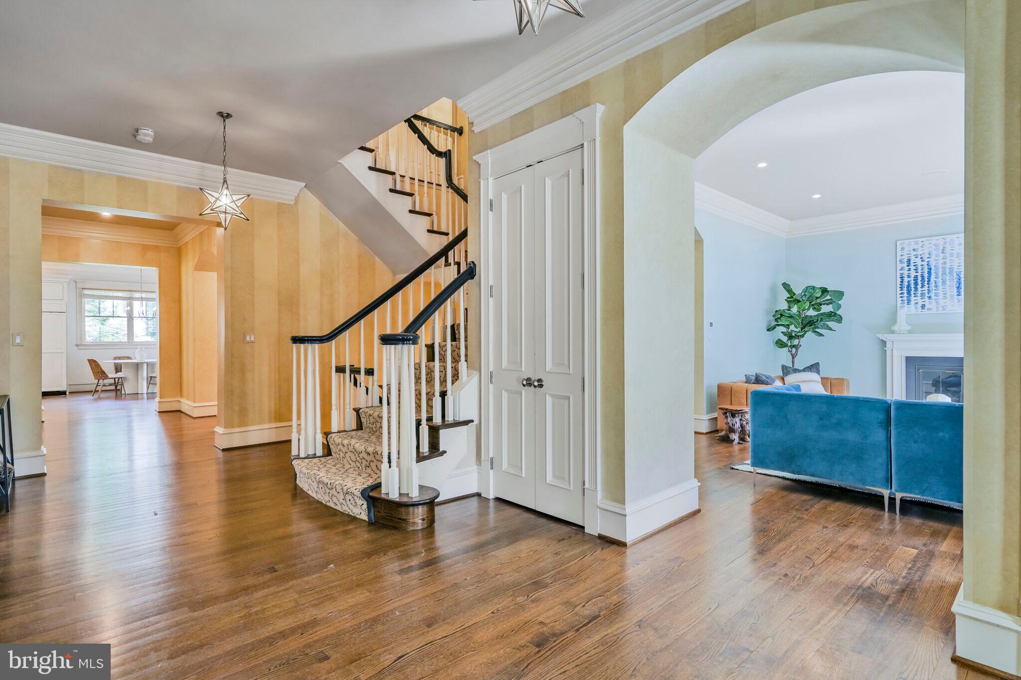 833 Herbert Springs Road Alexandria, VA 22308 - Photo 4 of 34 a view of an entryway with wooden floor and windows