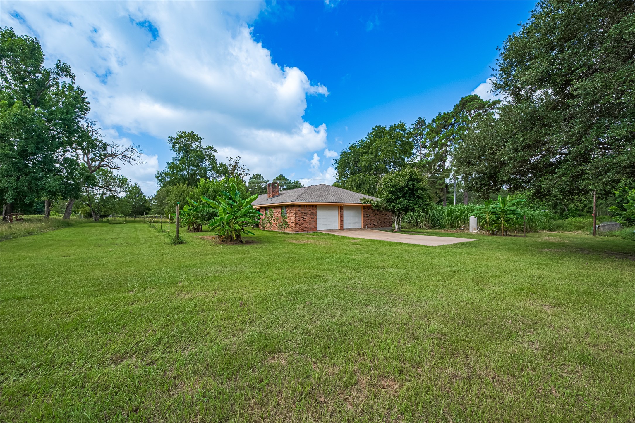 30525 Hegar Road Hockley, TX 77447 - Photo 33 of 49 a view of a house with a yard