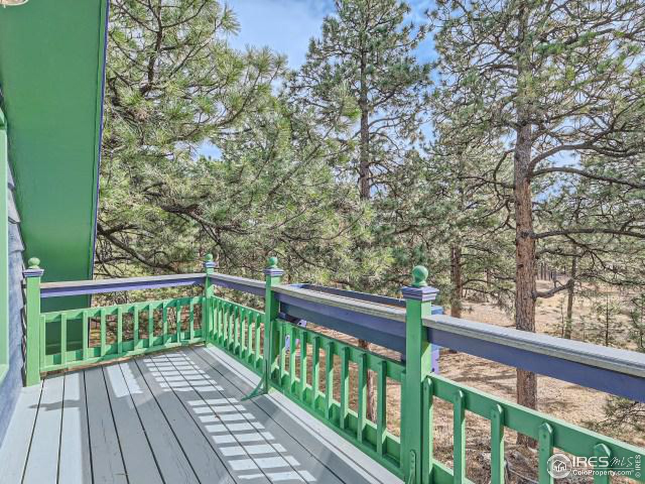 28 Wild Tiger Road Boulder, CO 80302 - Photo 25 of 39 a view of balcony with wooden floor