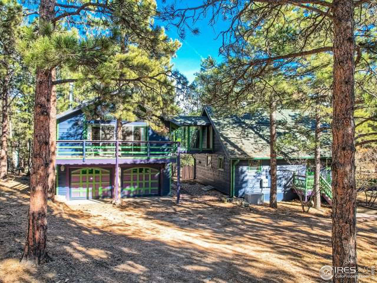 28 Wild Tiger Road Boulder, CO 80302 - Photo 3 of 39 a view of a house with a tree in front