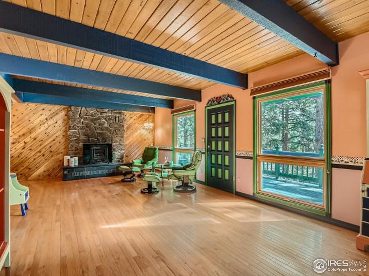 28 Wild Tiger Road Boulder, CO 80302 - Photo 6 of 39 a view of a patio with swimming pool table and chairs