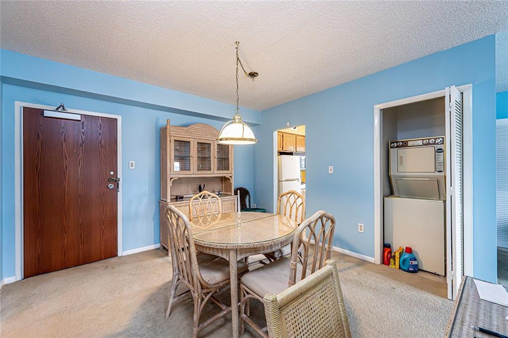 520 Washington Road, Unit 501 Pittsburgh, PA 15228 - Photo 17 of 27 DINING ROOM & IN UNIT LAUNDRY AREA