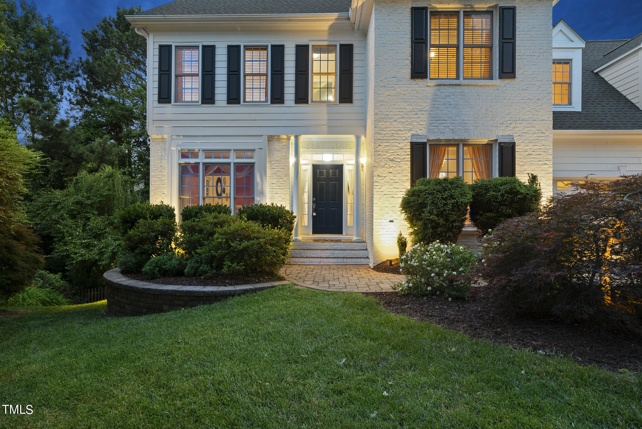 5509 Killarney Hope Drive Raleigh, NC 27613 - Photo 2 of 77 a front view of a house with garden