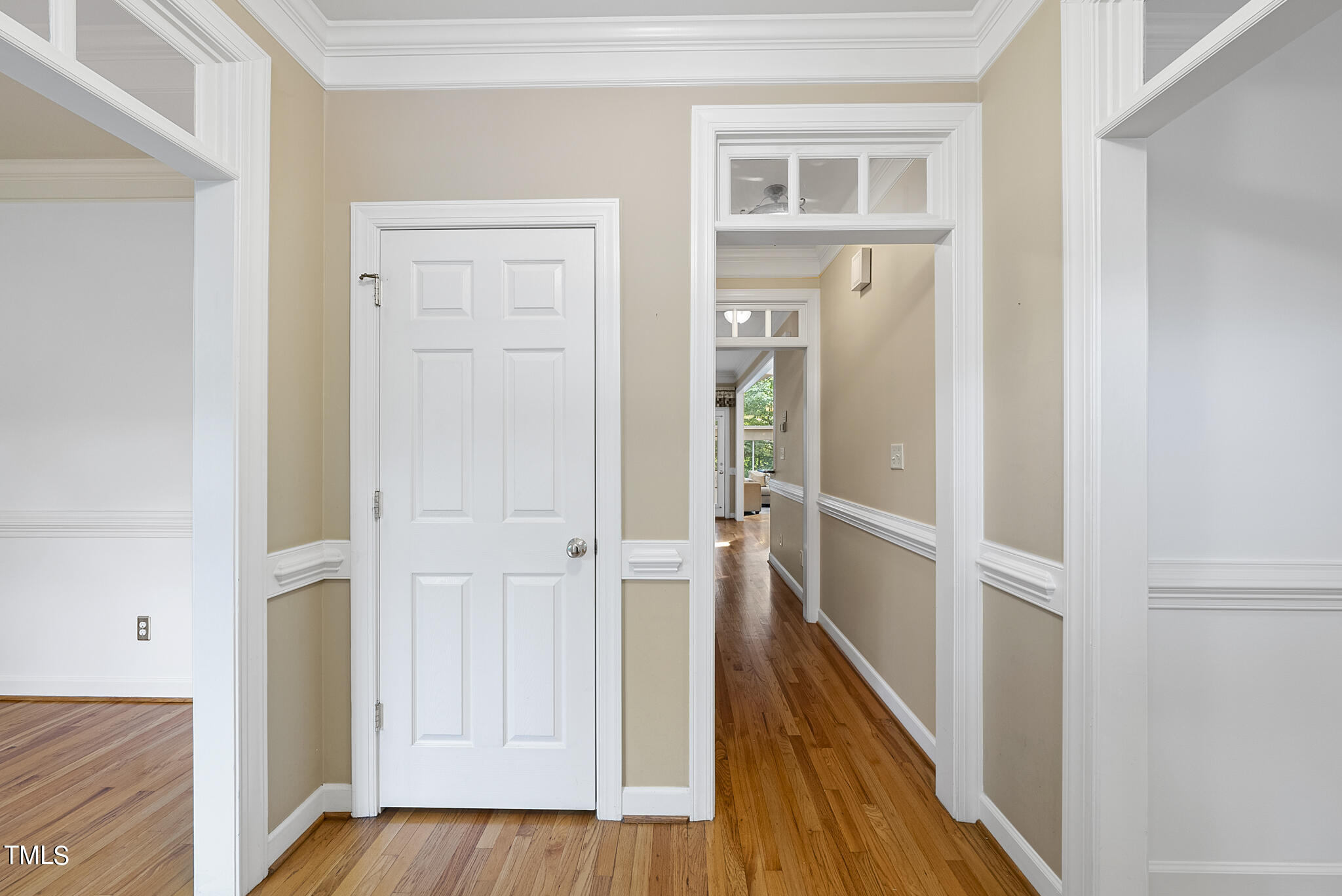 5509 Killarney Hope Drive Raleigh, NC 27613 - Photo 23 of 77 a view of a hallway with wooden floor and entryway