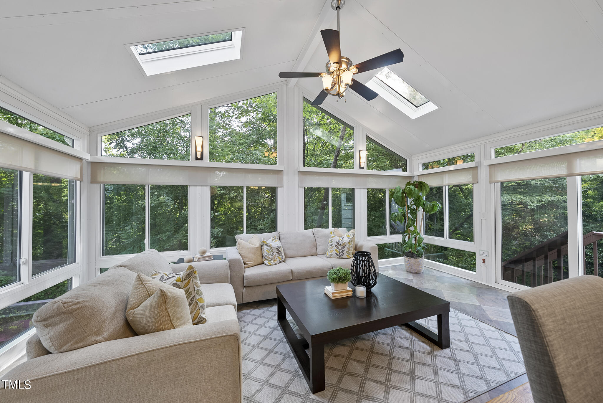 5509 Killarney Hope Drive Raleigh, NC 27613 - Photo 33 of 77 a living room with furniture and large windows