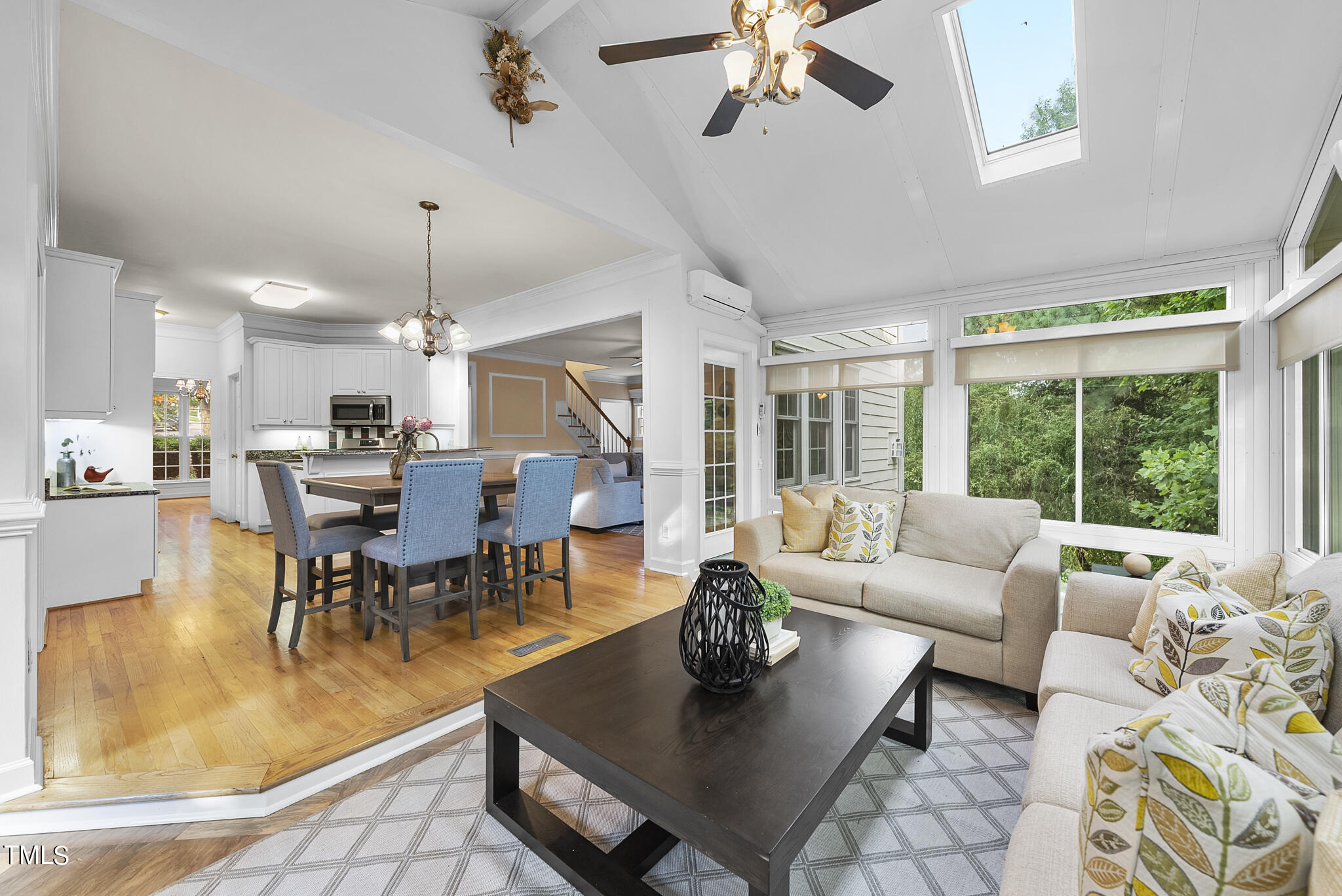 5509 Killarney Hope Drive Raleigh, NC 27613 - Photo 35 of 77 a living room with furniture and a large window