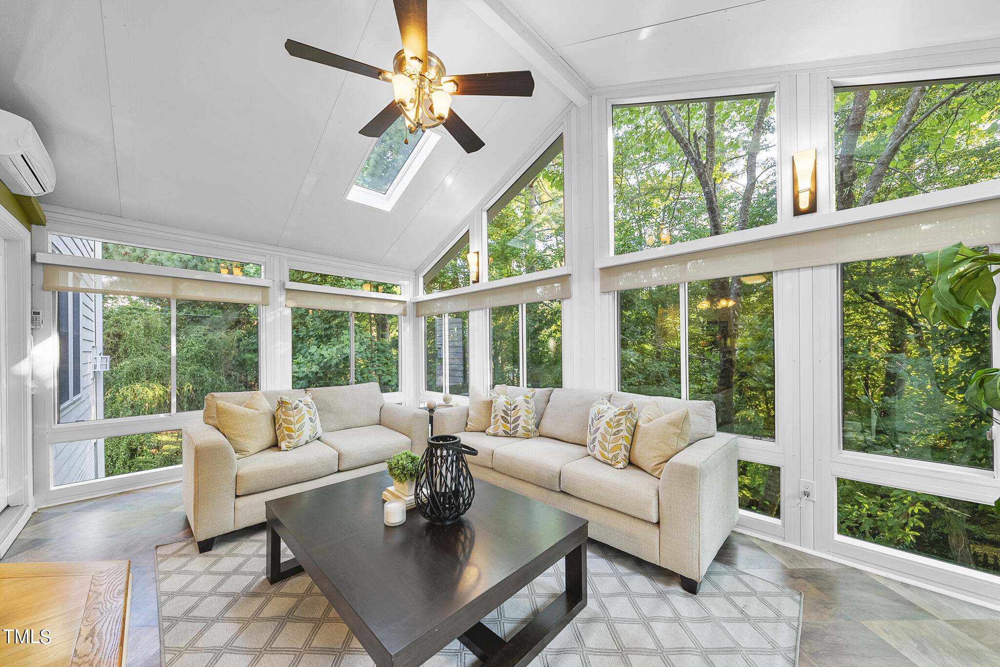 5509 Killarney Hope Drive Raleigh, NC 27613 - Photo 39 of 77 a living room with furniture and a large window