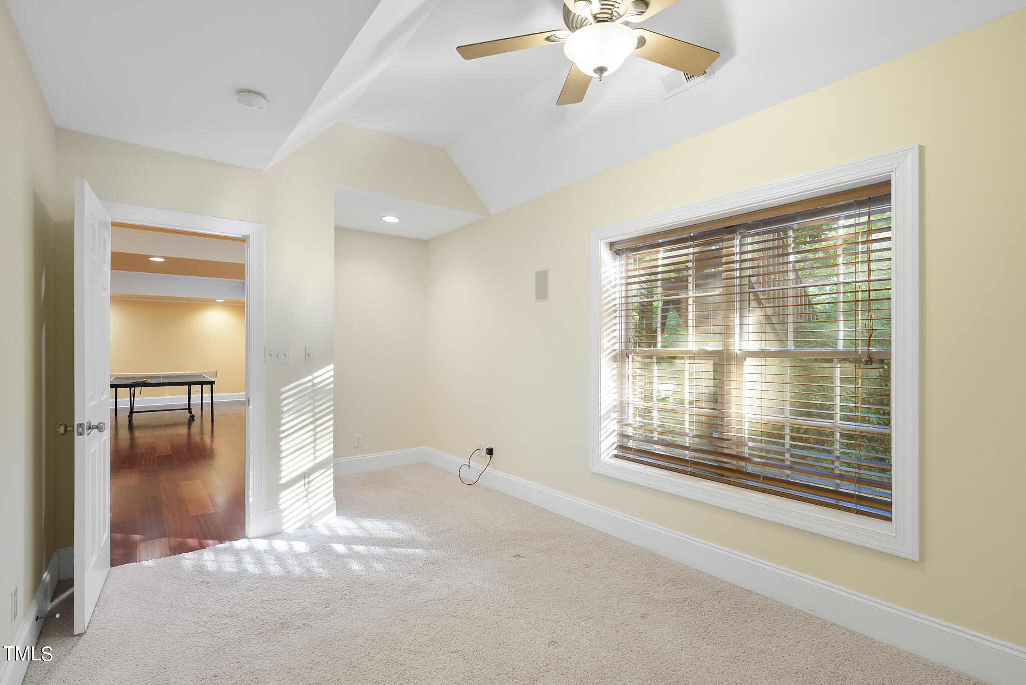 5509 Killarney Hope Drive Raleigh, NC 27613 - Photo 50 of 77 a view of an empty room with a window