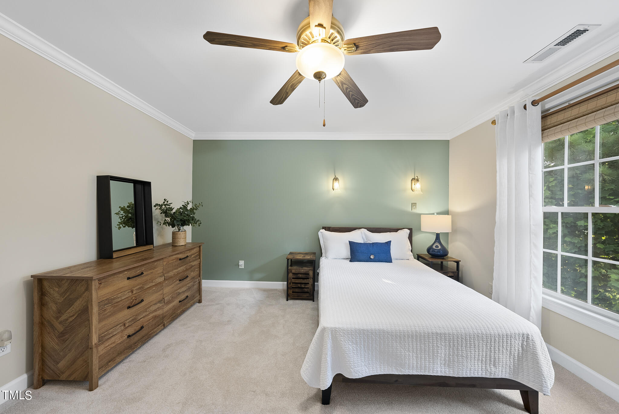 5509 Killarney Hope Drive Raleigh, NC 27613 - Photo 64 of 77 a bedroom with a bed and a dresser