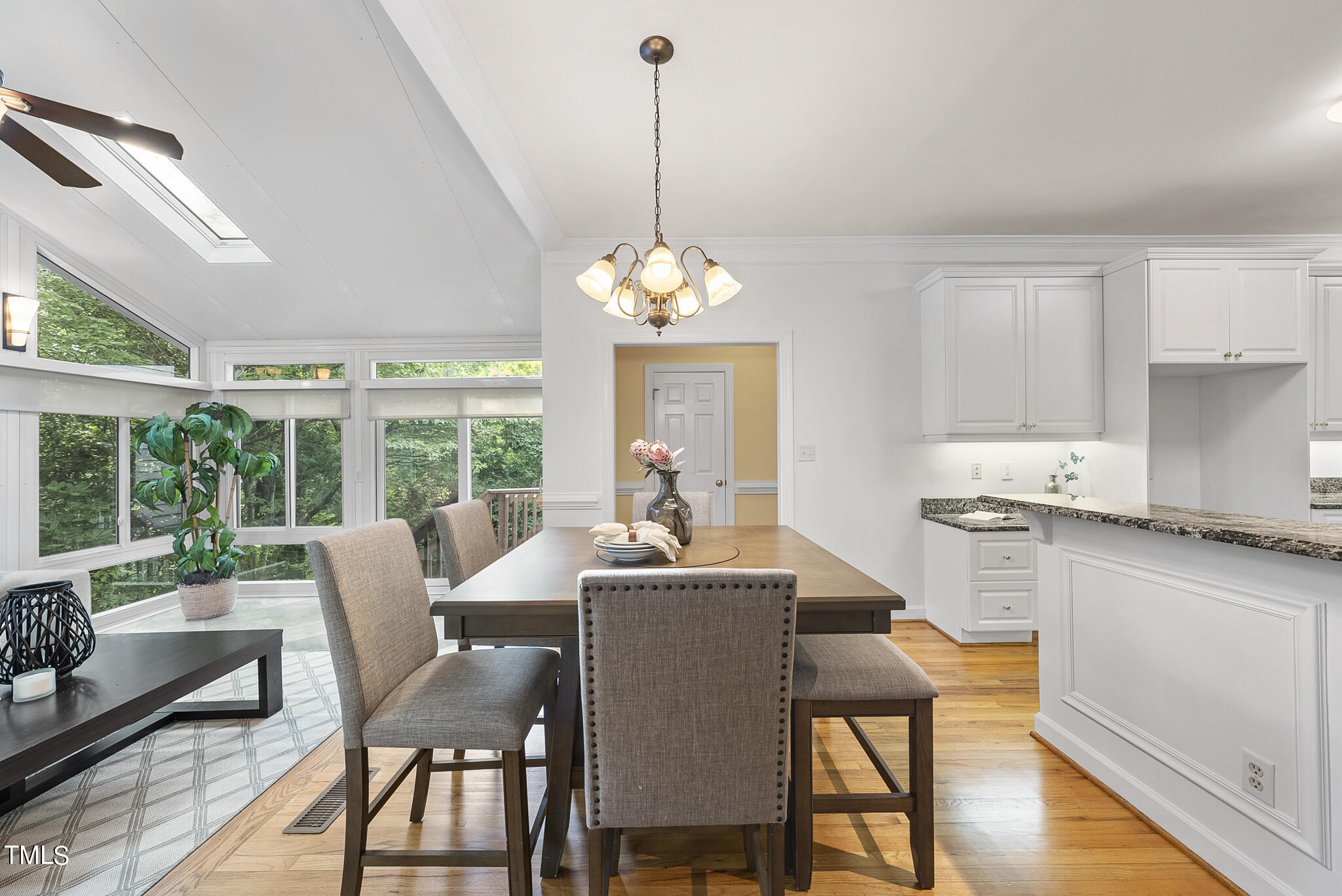 5509 Killarney Hope Drive Raleigh, NC 27613 - Photo 7 of 77 a dining room with furniture window wooden floor