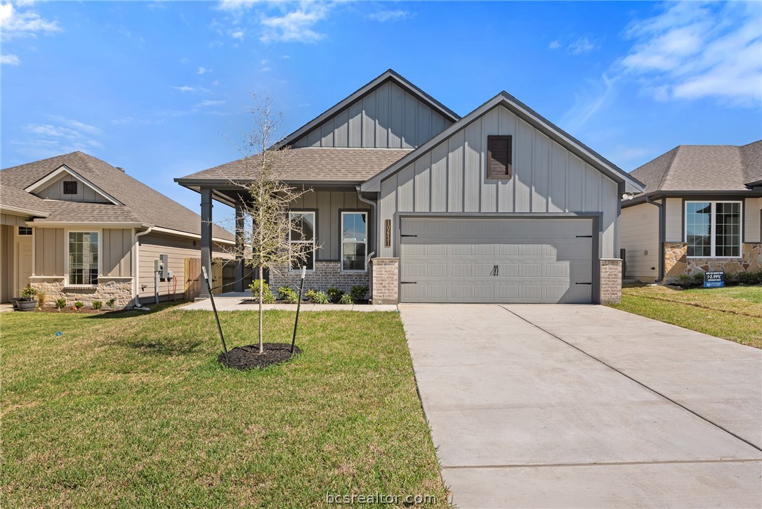 10631 Burgundy Berry Way Bryan, TX 77845 - Photo 1 of 1 a front view of a house with a yard and a porch