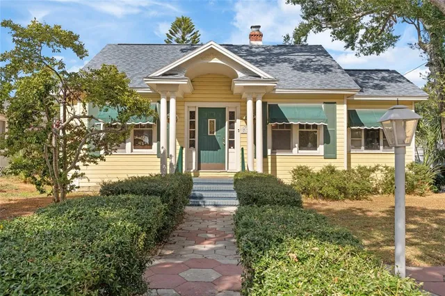 front view of a house with a yard