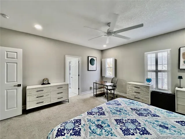 a workspace with furniture and window