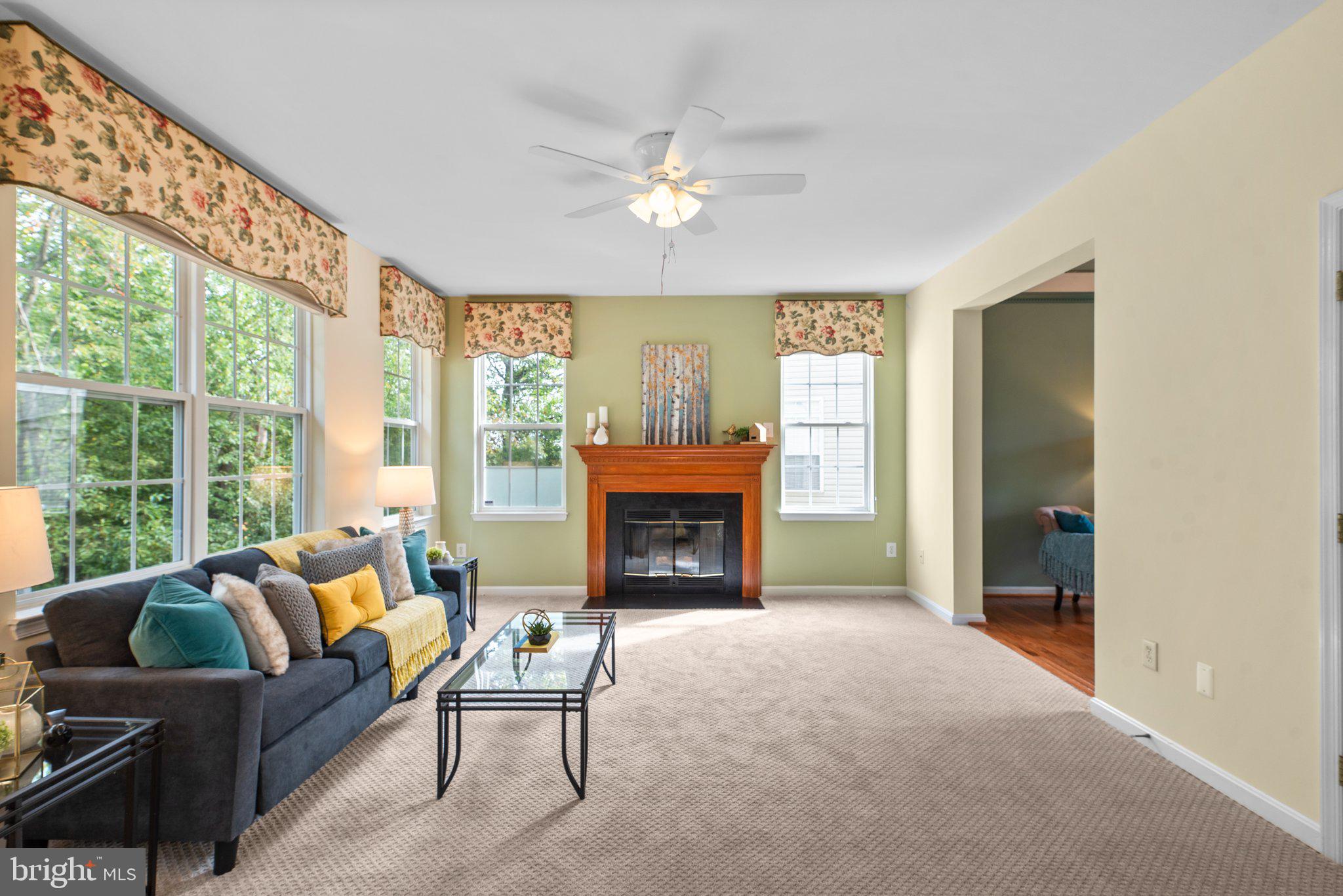 5929 Sandy Ridge Elkridge, MD 21075 - Photo 12 of 49 Warm wood burning fireplace
