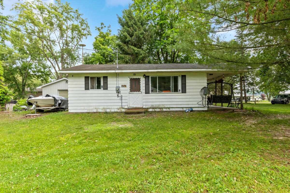 7979 Arthur Road Six Lakes, MI 48886 - Photo 1 of 26 Primary