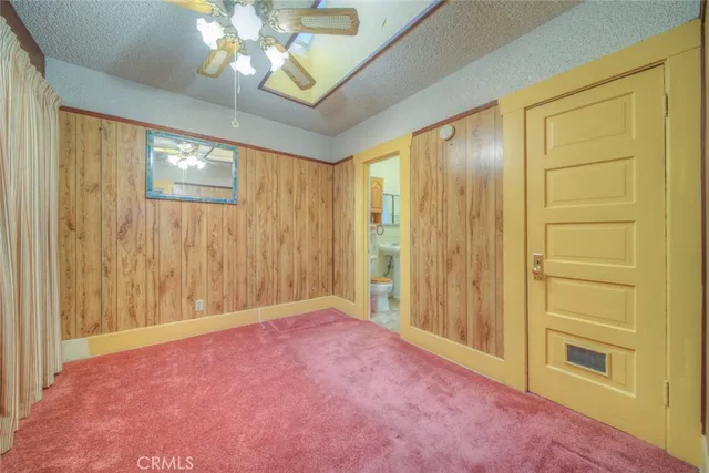 a kitchen with stainless steel appliances granite countertop a sink and a stove next to a window