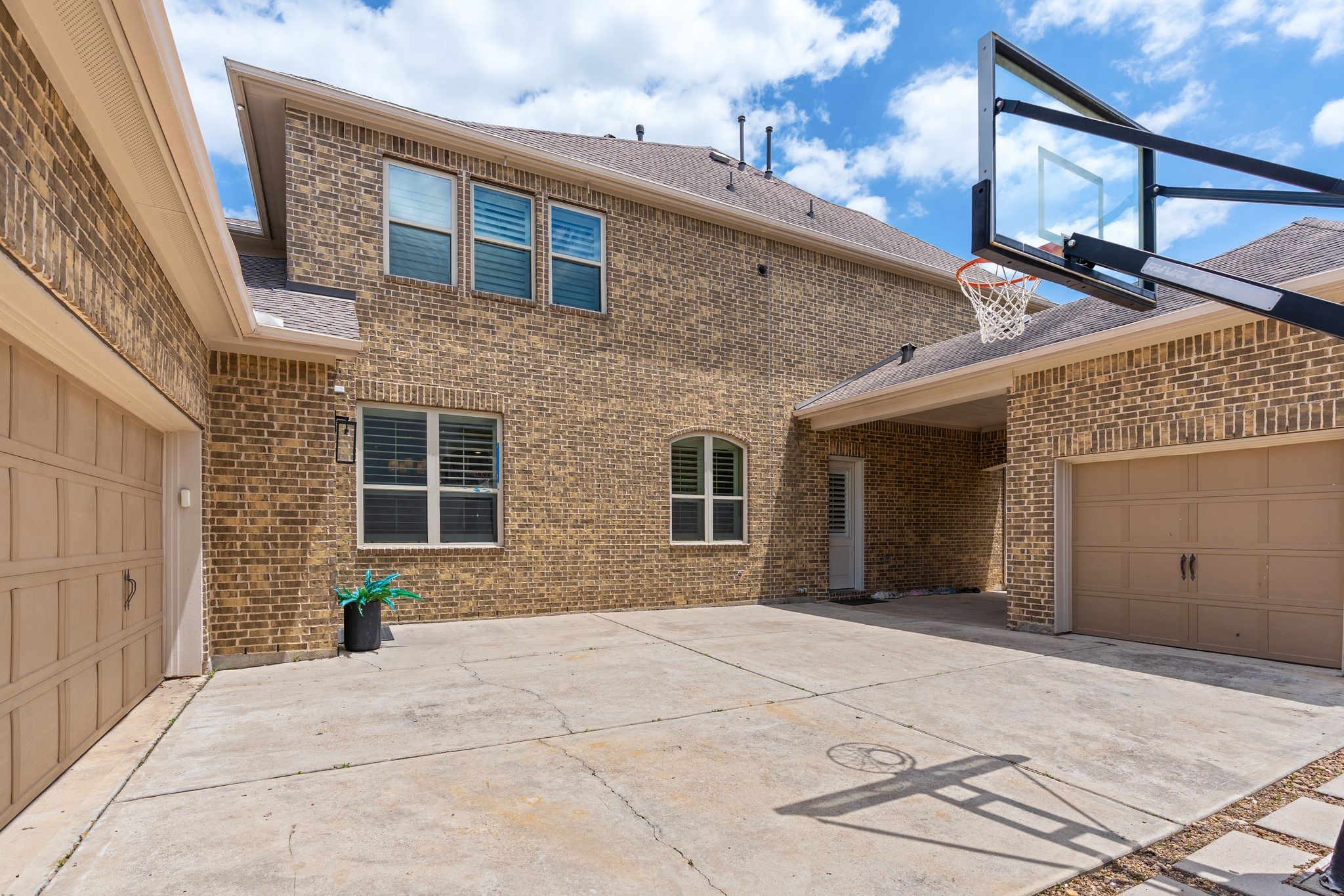 2914 Rutherford Pl Court Katy, TX 77494 - Photo 46 of 50 a view of a brick house with a large windows