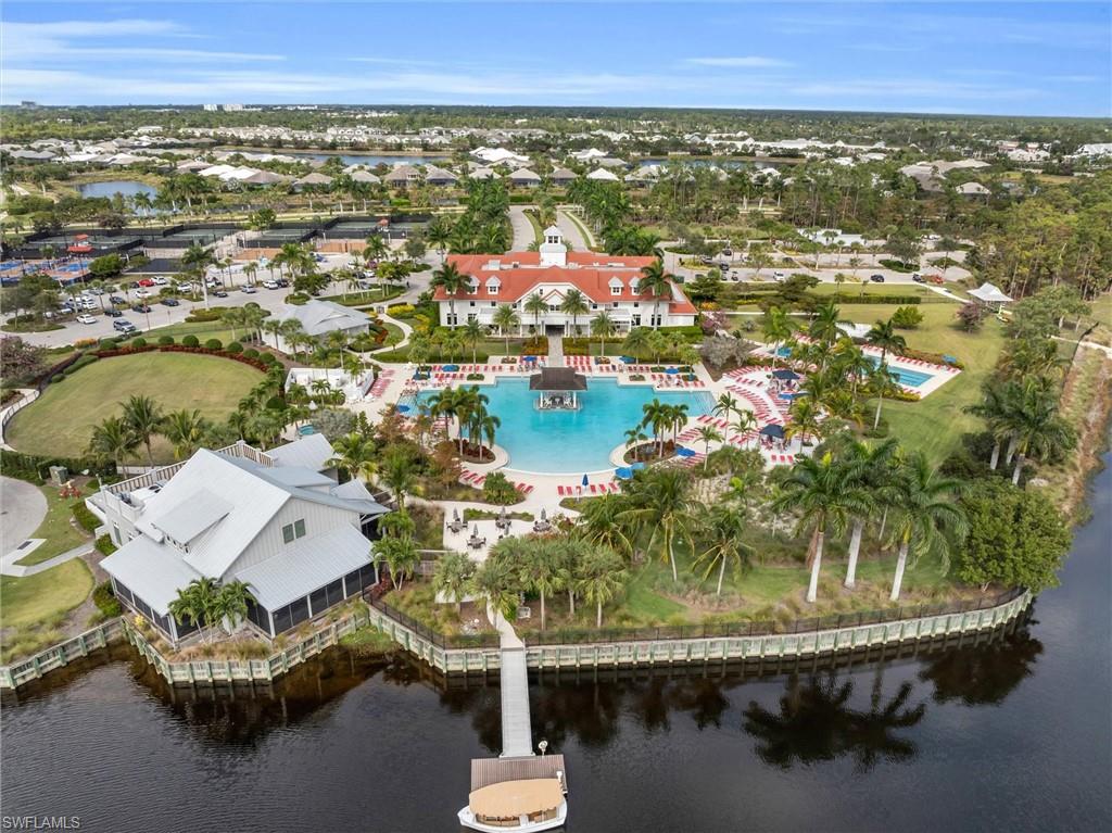 8795 Calypso Court Naples, FL 34113 - Photo 41 of 49 an aerial view of residential houses with outdoor space and swimming pool