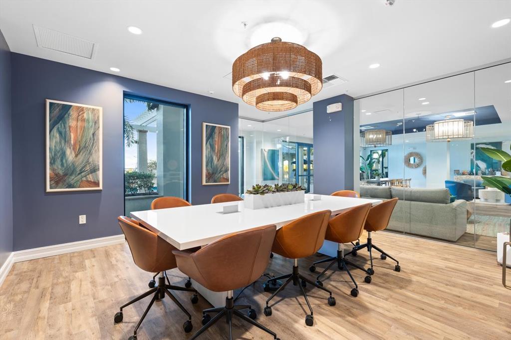536 Bahia Beach Boulevard, Unit 102A Ruskin, FL 33570 - Photo 24 of 28 a view of a dining room with furniture window and outside view