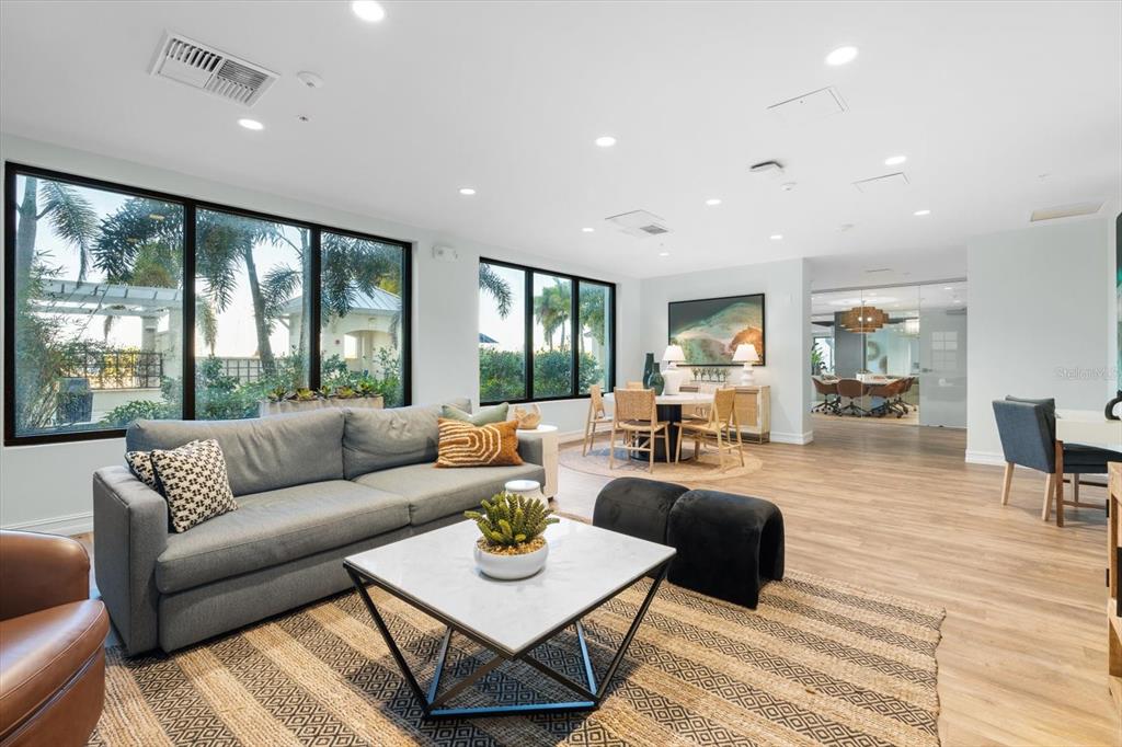 536 Bahia Beach Boulevard, Unit 102A Ruskin, FL 33570 - Photo 25 of 28 a living room with furniture and a large window