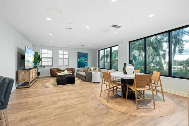 a view of a balcony with chairs and a table