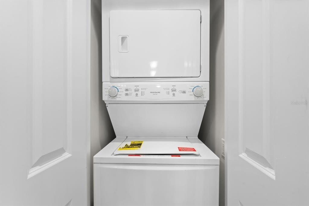 536 Bahia Beach Boulevard, Unit 102A Ruskin, FL 33570 - Photo 10 of 28 a utility room with dryer and washer