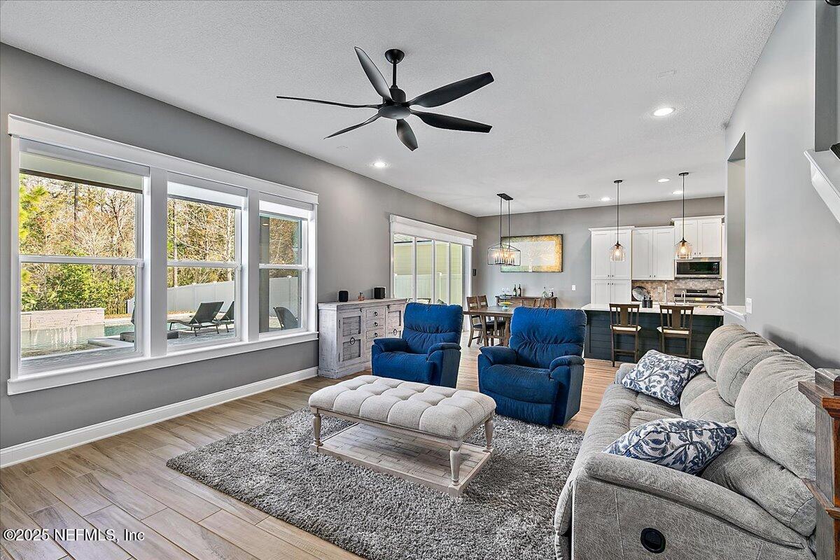 78 Calumet Drive St. Johns, FL 32259 - Photo 15 of 72 a living room with furniture and a large window