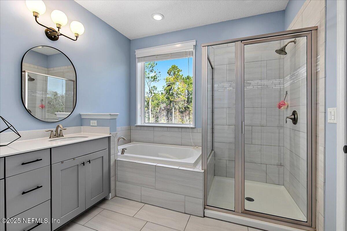 78 Calumet Drive St. Johns, FL 32259 - Photo 23 of 72 a bathroom with a sink a toilet and a mirror