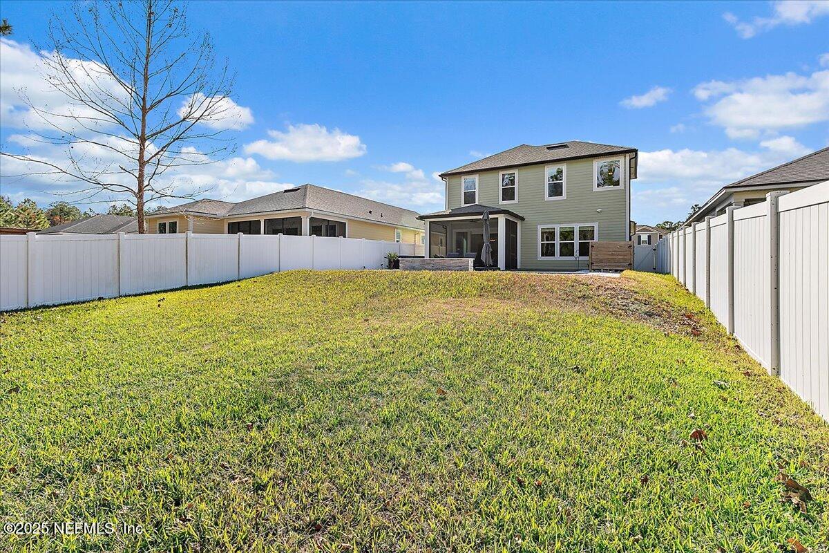 78 Calumet Drive St. Johns, FL 32259 - Photo 34 of 72 a large tree in front of a house with a big yard